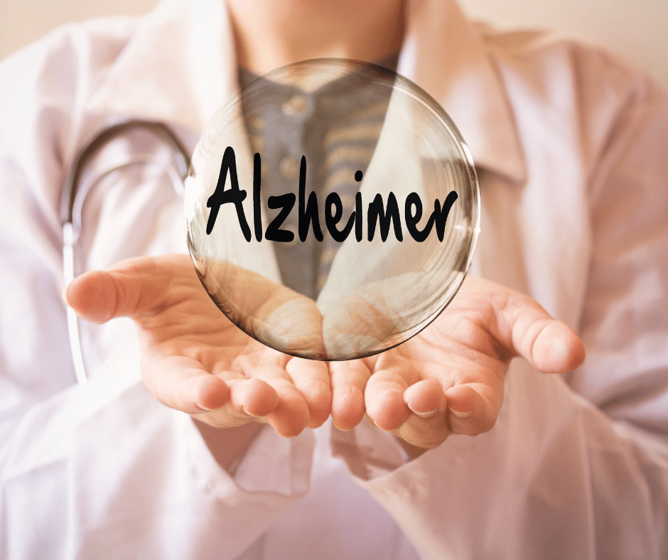 A doctor holding out his hands with the word alzheimer written on it.