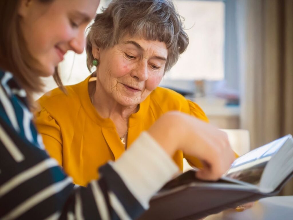 A daughter visiting a loved one in memory care